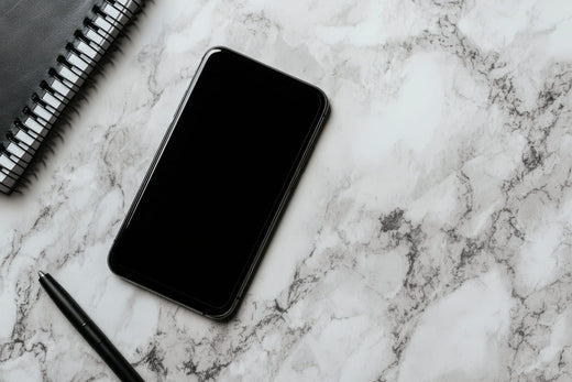 phone placed on quartz countertop charging wirelessly